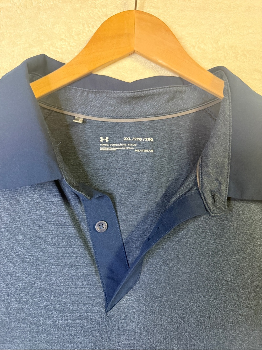 Under Armour Men’s Navy and Dark Heather Polo